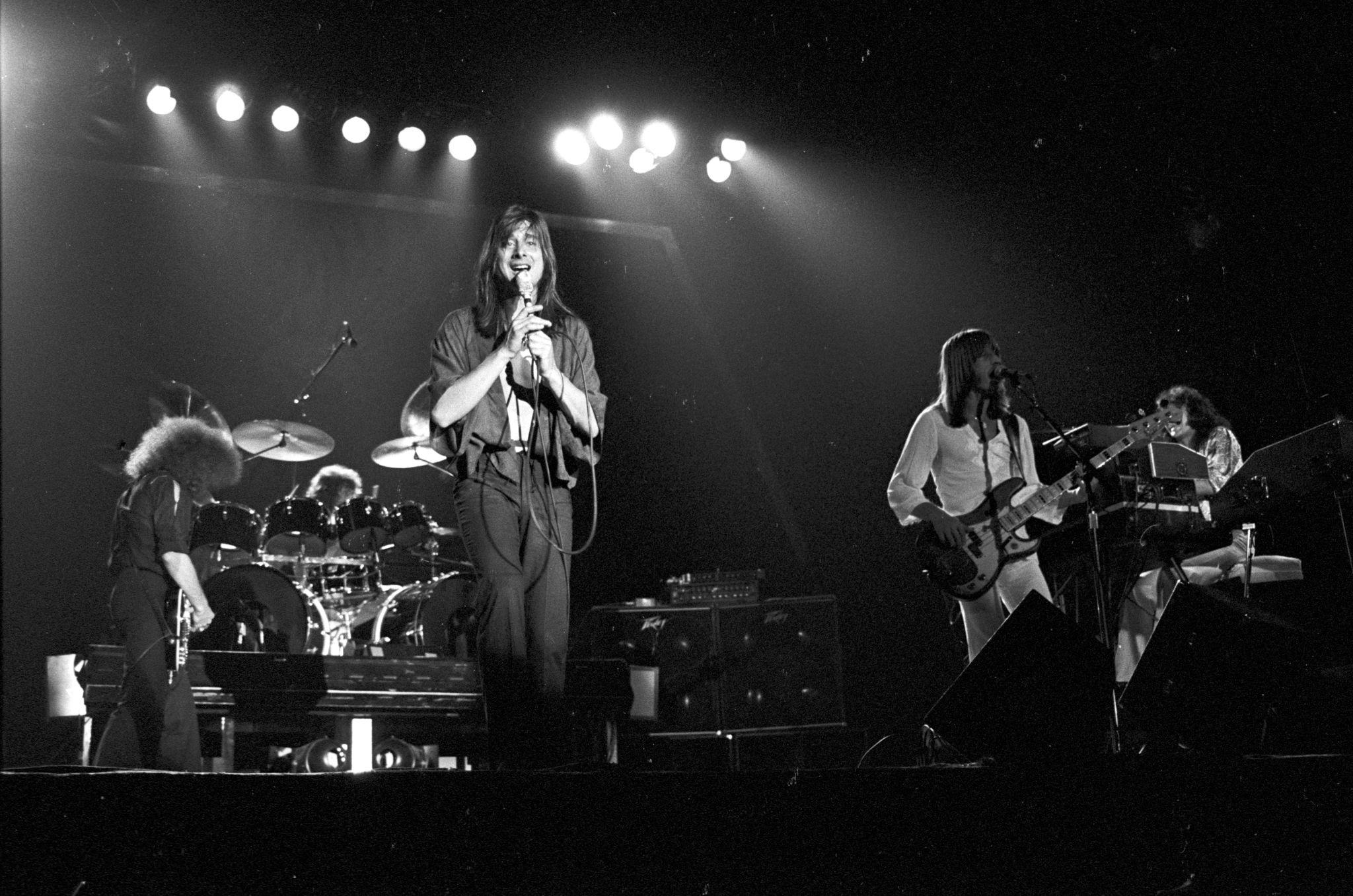 Journey performing during the Infinity tour.