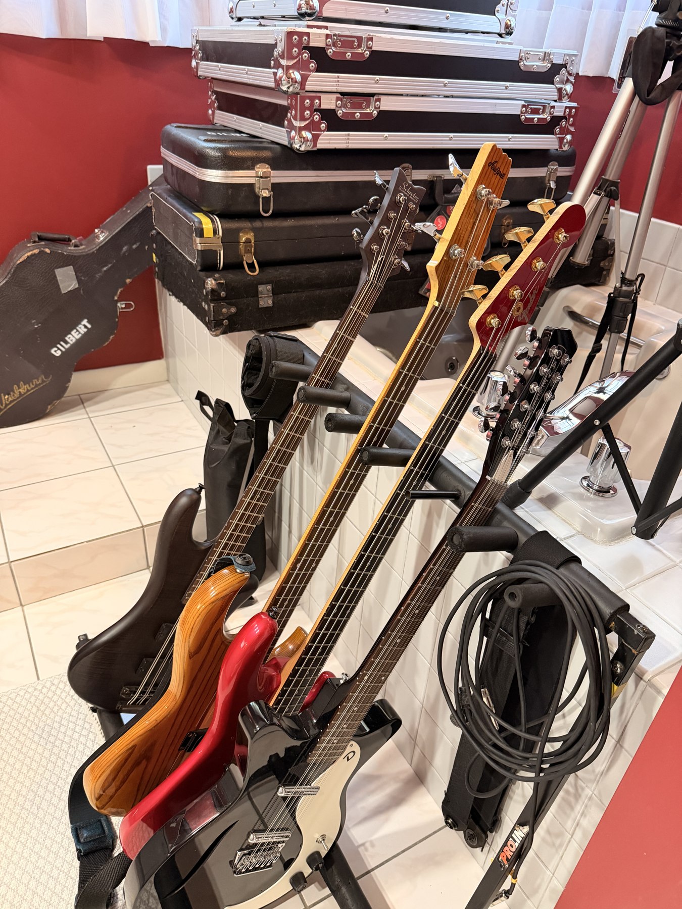 Guitars and basses prepared for recording at SodaPop House
