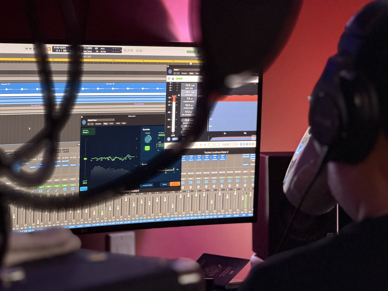 Scotto working on a recording mix at a studio monitor